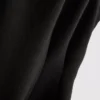 V-kaula-aukkoinen peplum-hihaton toppi