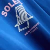 Ylisuuri Soleil-kuvioinen t-paita