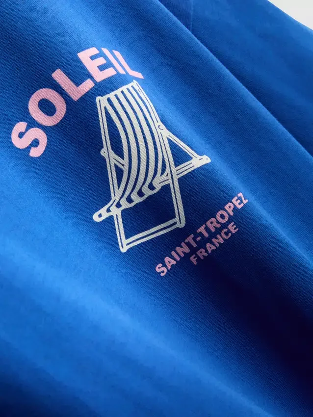 Ylisuuri Soleil-kuvioinen t-paita